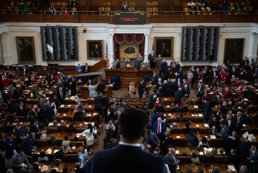 State Representatives and their families gather on the House floor on the opening day of the 88th Legislative Session at the state Capitol in Austin on Jan. 10, 2023.