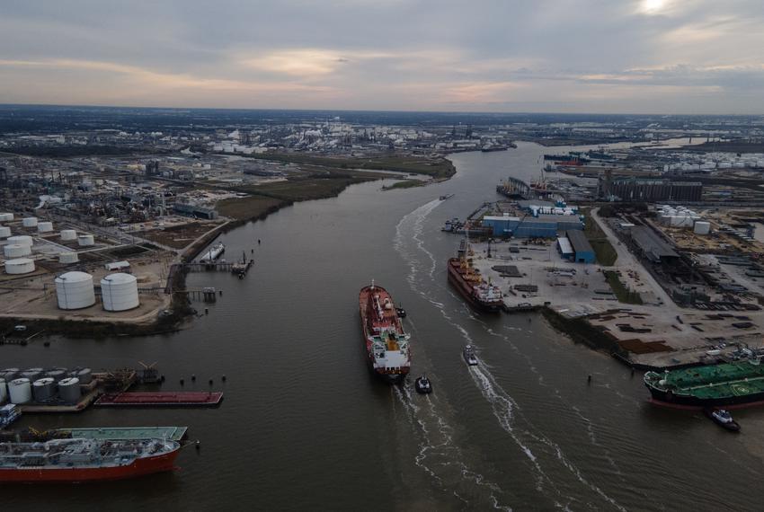 Barges float through the Houston Ship Channel on February 13, 2023.