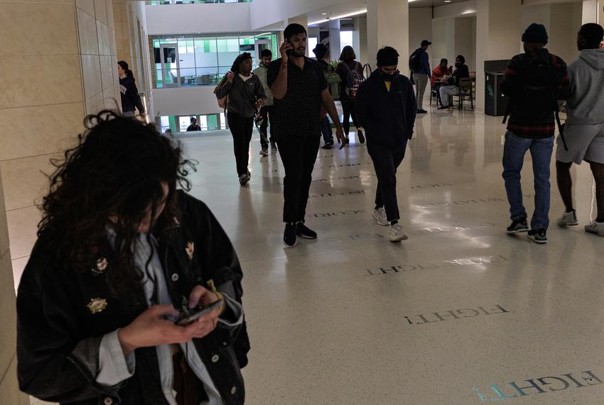 Students walk through halls on the University of North Texas campus in Denton on Feb. 24, 2022.