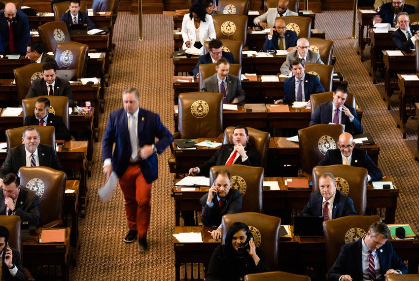 Members of the House vote on the House floor during session at the state Capitol on April 11, 2023.