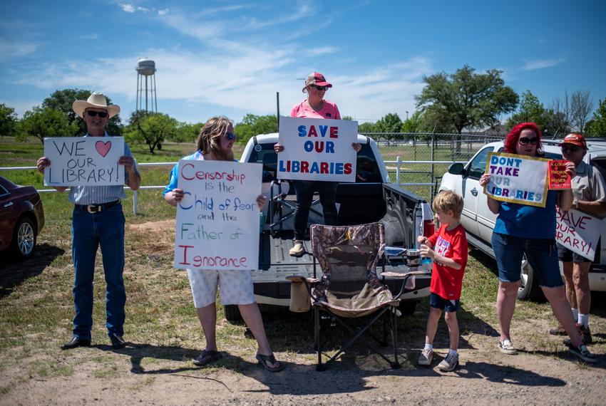 Protestors outside the Llano County Sheriffs office on Thursday, April 13, 2023. The county ruled that the library will remain open after a vote on whether or not to close it due to disagreements over book banning.