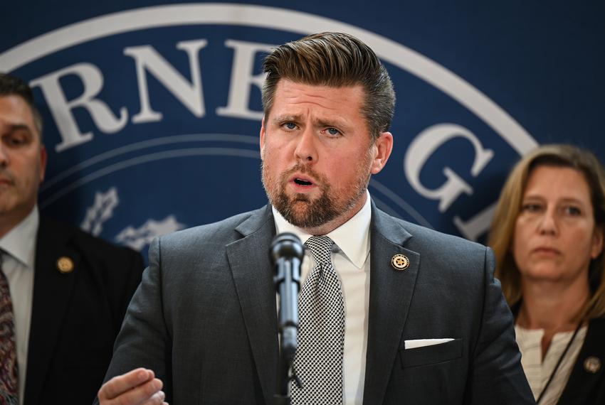 First Assistant Attorney General Brent Webster speaks during a press conference in the William Clements Building in Austin on June 9, 2022.