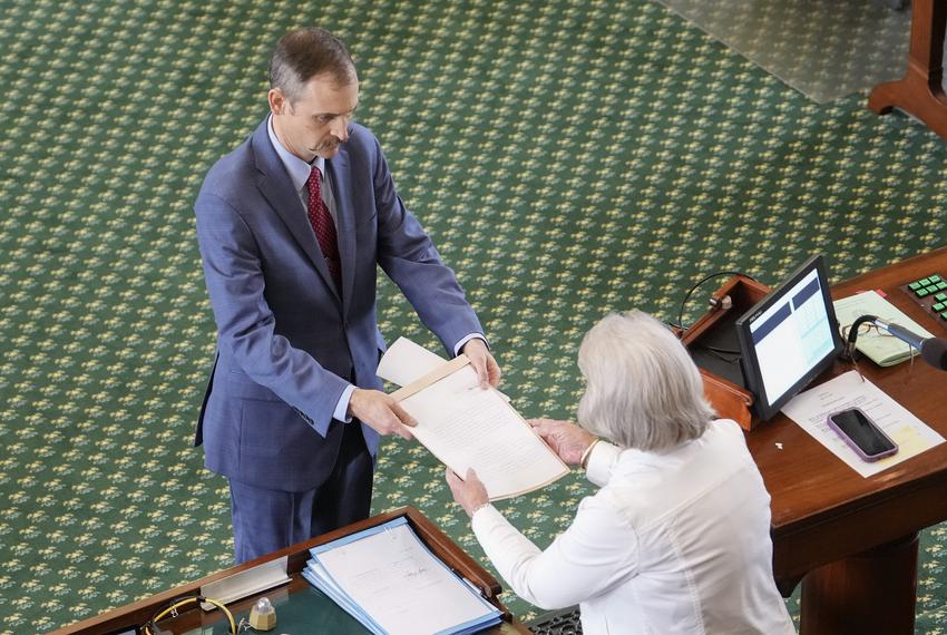 Rep. Andrew Murr delivers the Articles of Impeachment to Secretary of the Senate Patsy Spaw on May 29, 2023.