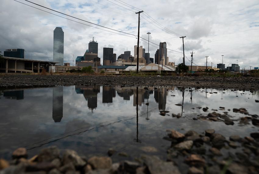 A undeveloped portion of land near a site for bullet train tracks and pedestrian bridges for the proposed bullet train terminus near downtown Dallas, on Thursday, Aug. 25, 2022. The entities in charge of a bullet train connection between Houston and DFW have faded despite Texas courts approving eminent domain to accomplish the massive project.