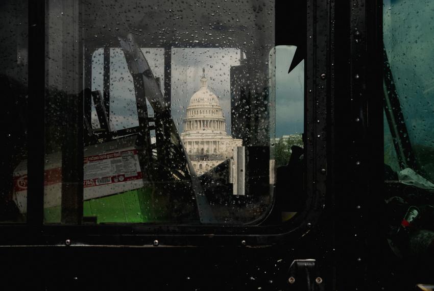 The U.S. Capitol is seen through a food truck window on April 14, 2022.