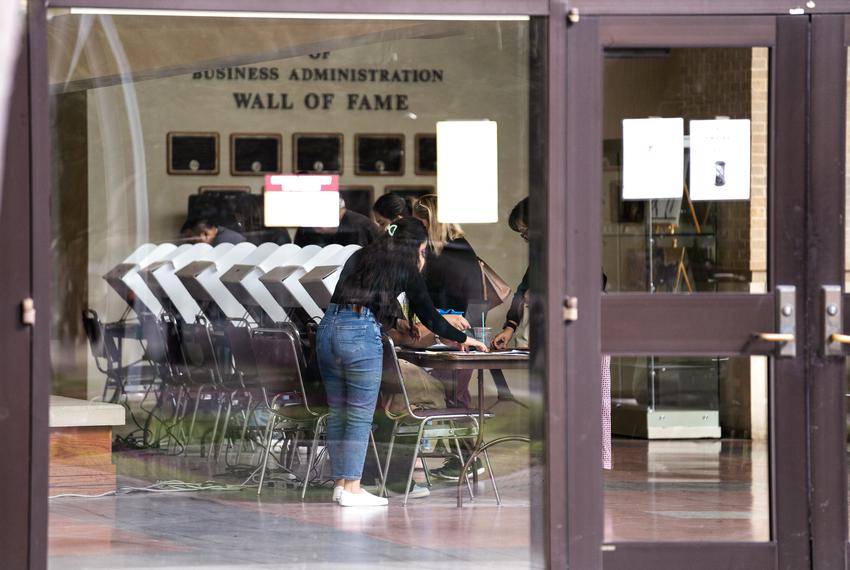 College students begin to vote at Texas A&M International University.