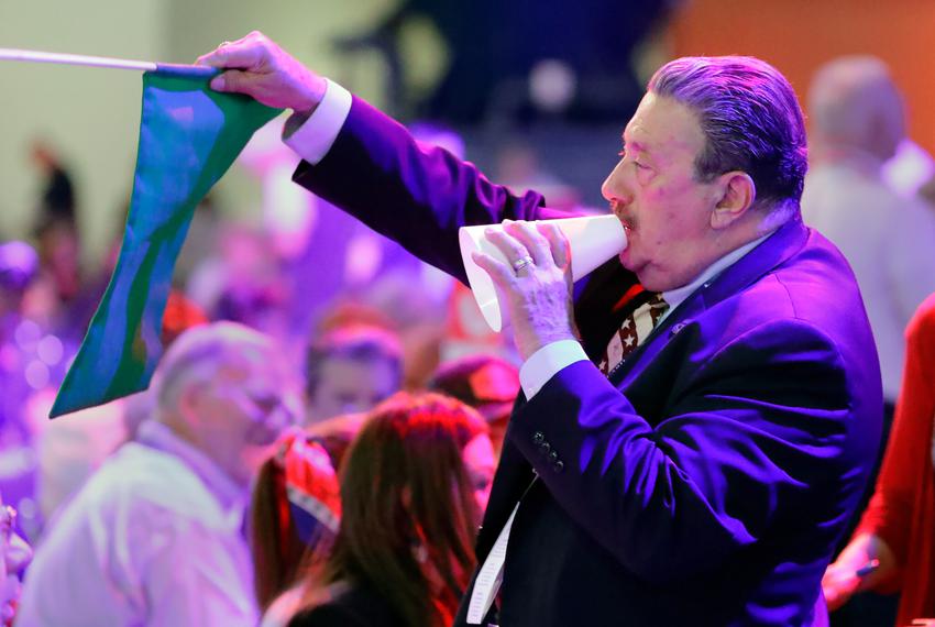 SD 7 delegate Alan Vera uses a megaphone to help direct priority ballots among the other delegates of his district during the third and final day of the Republican Party of Texas Convention on Saturday, June 18, 2022, held at the George R. Brown Convention Center in Houston.