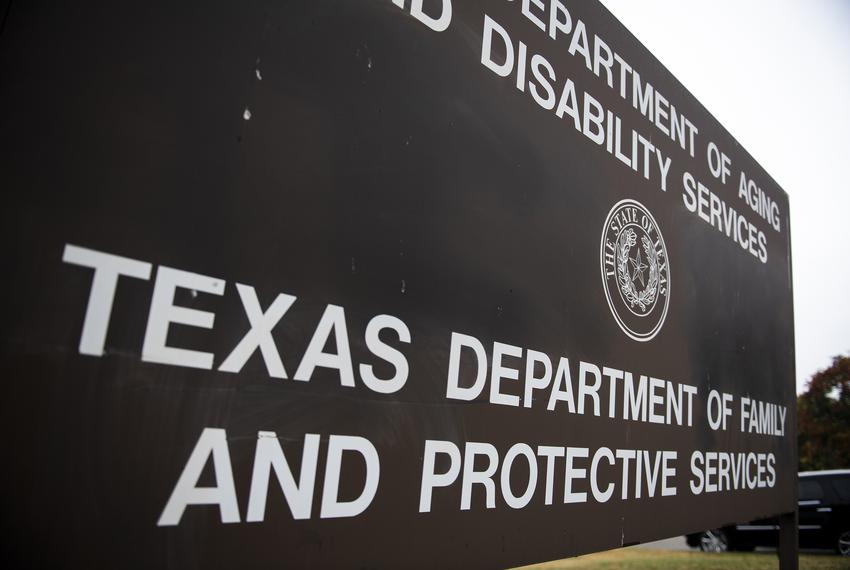 A sign for the Texas Department of Aging and Disability Services and the Texas Department of Family and Protective Services building in Austin on Nov. 14, 2019.
