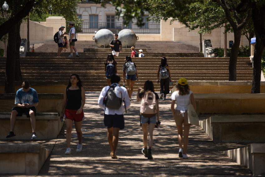Students walk up the East Mall stairs at the University of Texas at Austin on Aug. 25, 2021.
