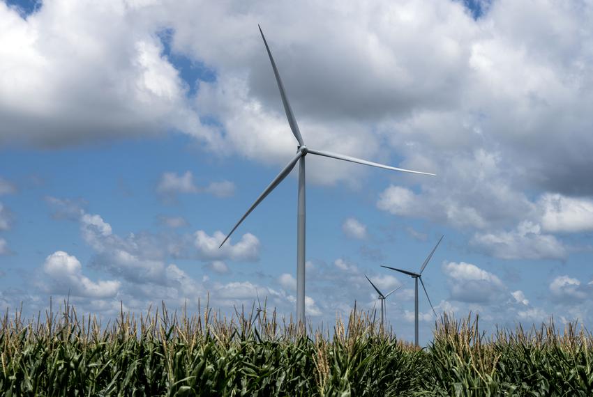 Lyford, TX - May 17, 2023: Industrial energy-producing wind turbines cover hundreds of acres of farmland in Lyford, TX. (Photo by Ben Lowy for The Texas Tribune)